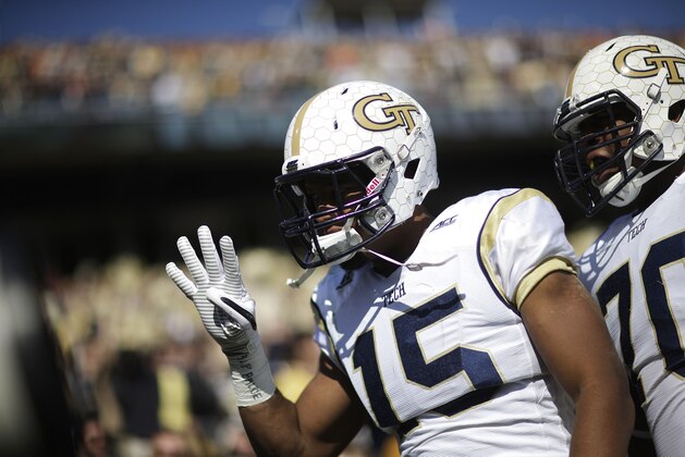 Georgia Tech's DeAndre Smelter, left, celebrates,  after scoring a touchdown in the third quarter of an NCAA college football game against Clemson, Saturday, Nov. 15, 2014, in Atlanta. (AP Photo/David Goldman)