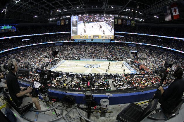 In this image made with a wide angle lens, Connecticut plays Maryland during the second half of the NCAA Women's Final Four tournament college basketball semifinal game, Sunday, April 5, 2015, in Tampa, Fla. Connecticut won 81-58.  (AP Photo/Chris O'Meara)