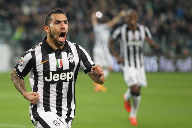 Juventus' Carlos Tevez celebrates after scoring during a Serie A soccer match between Juventus and Empoli at the Juventus stadium, in Turin, Italy, Saturday, April 4, 2015. (AP Photo/ Massimo Pinca)