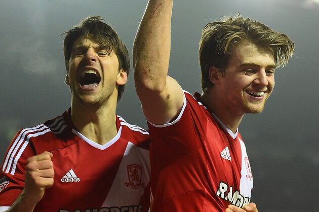 DERBY, ENGLAND - MARCH 17:  Patrick Bamford of Middlesbrough (R) celebrates scoring the opening goal with George Friend of Middlesbrough during the Sky Bet Championship match between Derby County and Middlesbrough at iPro Stadium on March 17, 2015 in Derby, England.  (Photo by Laurence Griffiths/Getty Images)