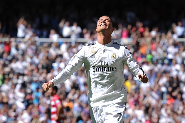 MADRID, SPAIN - APRIL 05: Cristiano Ronaldo of Real Madrid CF celebrates after scoring his team's 3rd goal during the La Liga match between Real Madrid CF and Granada CF at Estadio Santiago Bernabeu on April 5, 2015 in Madrid, Spain. (Photo by Denis Doyle/Getty Images) MADRID, SPAIN - APRIL 05: Cristiano Ronaldo of Real Madrid CF celebrates after scoring his team's 3rd goal during the La Liga match between Real Madrid CF and Granada CF at Estadio Santiago Bernabeu on April 5, 2015 in Madrid, Spain. (Photo by Denis Doyle/Getty Images)