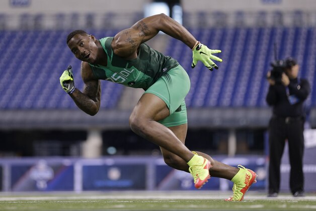 Virginia defensive lineman Eli Harold runs a drill at the NFL football scouting combine in Indianapolis, Sunday, Feb. 22, 2015. (AP Photo/David J. Phillip)