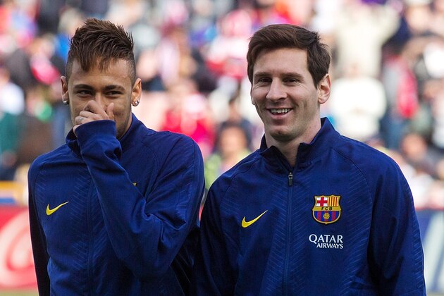 GRANADA, SPAIN - FEBRUARY 28:  Neymar JR. (L) of FC Barcelona and his teammate Lionel Messi (R) leaves the pitch after their warming up before the La Liga match between Granada CF and FC Barcelona at Nuevo Estadio de los Carmenes on February 28, 2015 in Granada, Spain.  (Photo by Gonzalo Arroyo Moreno/Getty Images)
