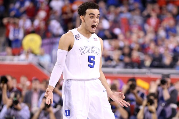 INDIANAPOLIS, IN - APRIL 06: Tyus Jones #5 of the Duke Blue Devils reacts after a three point basket late in the second half against the Wisconsin Badgers during the NCAA Men's Final Four National Championship at Lucas Oil Stadium on April 6, 2015 in Indianapolis, Indiana.  (Photo by Andy Lyons/Getty Images)