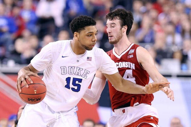 INDIANAPOLIS, IN - APRIL 06: Jahlil Okafor #15 of the Duke Blue Devils handles the ball against Frank Kaminsky #44 of the Wisconsin Badgers in the second half during the NCAA Men's Final Four National Championship at Lucas Oil Stadium on April 6, 2015 in Indianapolis, Indiana.  (Photo by Streeter Lecka/Getty Images)