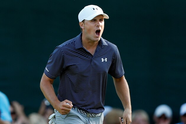 PALM HARBOR, FL - MARCH 15:  Jordan Spieth celebrates after putting on the 18th green to force be a part of a playoff during the final round of the Valspar Championship at Innisbrook Resort Copperhead Course on March 15, 2015 in Palm Harbor, Florida.  (Photo by Mike Lawrie/Getty Images)