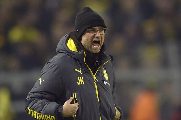 Dortmund's head coach Juergen Klopp shouts to his team during the German Bundesliga soccer match between Borussia Dortmund and FSV Mainz in Dortmund, Germany, Friday, Feb. 13, 2015. (AP Photo/Martin Meissner)