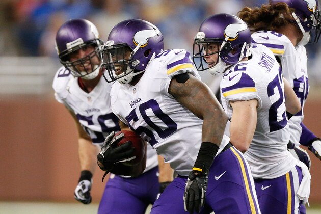 DETROIT, MI - SEPTEMBER 08: Erin Henderson #50 of the Minnesota Vikings celebrates his second quarter touchdown with teammates while playing the Detroit Lions at Ford Field on September 8, 2013 in Detroit, Michigan. (Photo by Gregory Shamus/Getty Images)