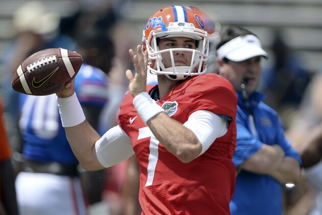 Florida quarterback Will Grier loosens up before their spring NCAA college football game Saturday, April 12, 2014, in Gainesville, Fla. (AP Photo/Phil Sandlin)