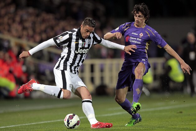 FLORENCE, ITALY - APRIL 07: Stefan Savic of ACF Fiorentina fights for the ball with Alessandro Matri of Juventus FC during the TIM cup match between ACF Fiorentina and Juventus FC at Artemio Franchi on April 7, 2015 in Florence, Italy.  (Photo by Gabriele Maltinti/Getty Images)