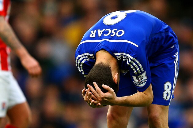 LONDON, ENGLAND - APRIL 04:  Oscar of Chelsea reacts during the Barclays Premier League match between Chelsea and Stoke City at Stamford Bridge on April 4, 2015 in London, England.  (Photo by Richard Heathcote/Getty Images)