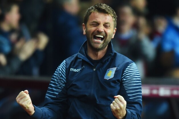 BIRMINGHAM, ENGLAND - APRIL 07:  Tim Sherwood manager of Aston Villa celebrates as Christian Benteke of Aston Villa scores their second goal during the Barclays Premier League match between Aston Villa and Queens Park Rangers at Villa Park on April 7, 2015 in Birmingham, England.  (Photo by Michael Regan/Getty Images,)
