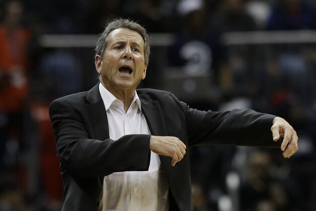 Atlanta Hawks managing partner Bruce Levenson yells at an official in the second half of an NBA  basketball game Wednesday, Dec. 4, 2013, in Atlanta.  Atlanta won 107-97. (AP Photo/John Bazemore)