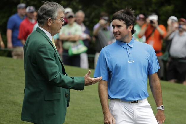 Bubba Watson, right, speaks with Billy Payne, Chairman of Augusta National Golf Club during a practice round for the Masters golf tournament Monday, April 6, 2015, in Augusta, Ga. (AP Photo/Matt Slocum)
