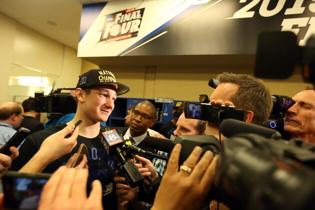 INDIANAPOLIS, IN - APRIL 06:  Grayson Allen #3 of the Duke Blue Devils speaks to the media in the locker room after defeating the Wisconsin Badgers during the NCAA Men's Final Four National Championship at Lucas Oil Stadium on April 6, 2015 in Indianapolis, Indiana. Duke defeated Wisconsin 68-63.  (Photo by Streeter Lecka/Getty Images)