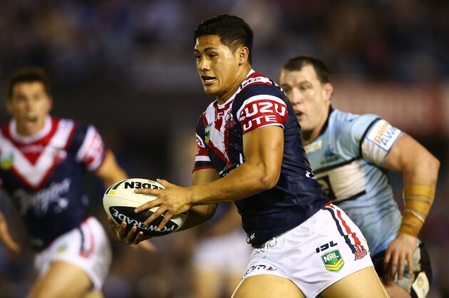 SYDNEY, AUSTRALIA - AUGUST 26:  Roger Tuivasa-Sheck of the Roosters makes a line break during the round 24 NRL match between the Cronulla Sharks and the Sydney Roosters at Remondis Stadium on August 26, 2013 in Sydney, Australia.  (Photo by Mark Nolan/Getty Images)
