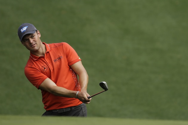 Martin Kaymer, of Germany, watches his chip shot on the 10th hole during a practice round for the Masters golf tournament Monday, April 6, 2015, in Augusta, Ga. (AP Photo/Matt Slocum)