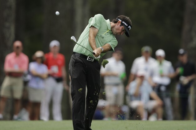Bubba Watson hits on the 14th hole during a practice round for the Masters golf tournament Tuesday, April 7, 2015, in Augusta, Ga. (AP Photo/Matt Slocum)