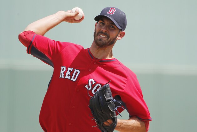 Boston Red Sox' starting pitcher Rick Porcello (22) delivers against the Minnesota Twins during the first inning of an exhibition spring training baseball game, Wednesday, March 18, 2015, in Fort Myers, Fla. (AP Photo/Brynn Anderson)