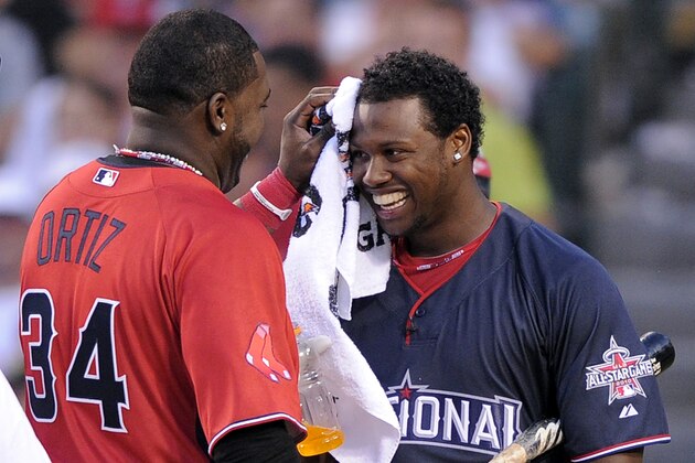 Boston Red Sox's David Ortiz, left, swabs Florida Marlins' Hanley Ramirez during a break in baseball's All-Star home run derby Monday, July 12, 2010, in Anaheim, Calif. (AP Photo/Mark J. Terrill)