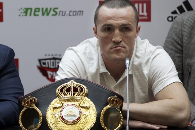 WBA cruiserweight regular champion Denis Lebedev, of Russia, listens during a news conference in Moscow, Russia, on Monday, April 21, 2014. In May 2013 Guillermo Jones, of Panama, stopped Lebedev on a technical knockout in 11th round. Then, the WBA handed the title back to Lebedev when Jones failed a drug test. Jones was made WBA champion-in-recess on the condition he must fight Lebedev again.  Rematch scheduled for April 25. (AP Photo/Ivan Sekretarev)