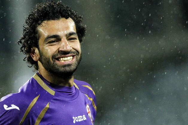 Fiorentina's Mohamed Salah Ghaly, left, celebrates after scoring during a Serie A soccer match between Fiorentina and Sampdoria   at the Artemio Franchi stadium in Florence, Italy  Saturday, April 4, 2015. (AP Photo/Fabrizio Giovannozzi)