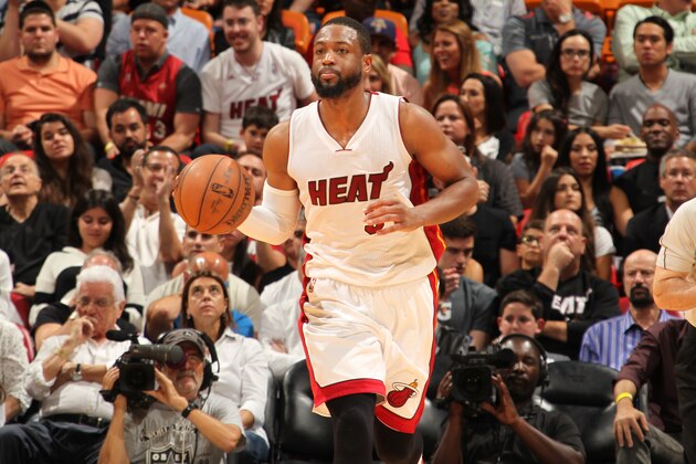 MIAMI, FL - APRIL 7:  Dwyane Wade #3 of the Miami Heat brings the ball up court against the Charlotte Hornets on April 7, 2015 at American Airlines Arena in Miami, Florida.  NOTE TO USER: User expressly acknowledges and agrees that, by downloading and or using this Photograph, user is consenting to the terms and conditions of the Getty Images License Agreement. Mandatory Copyright Notice: Copyright 2015 NBAE (Photo by Issac Baldizon/NBAE via Getty Images)