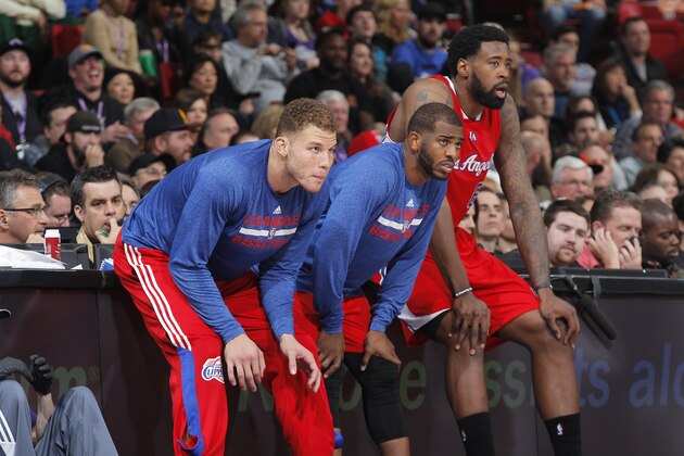 SACRAMENTO, CA - JANUARY 17: Blake Griffin #32, Chris Paul #3 and DeAndre Jordan #6 of the Los Angeles Clippers wait to check into the game against the Sacramento Kings on January 17, 2015 at Sleep Train Arena in Sacramento, California. NOTE TO USER: User expressly acknowledges and agrees that, by downloading and or using this photograph, User is consenting to the terms and conditions of the Getty Images Agreement. Mandatory Copyright Notice: Copyright 2015 NBAE (Photo by Rocky Widner/NBAE via Getty Images)