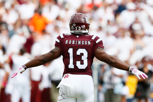 STARKVILLE, MS - OCTOBER 11:  Josh Robinson #13 of the Mississippi State Bulldogs against the Auburn Tigers at Davis Wade Stadium on October 11, 2014 in Starkville, Mississippi.  (Photo by Kevin C. Cox/Getty Images)