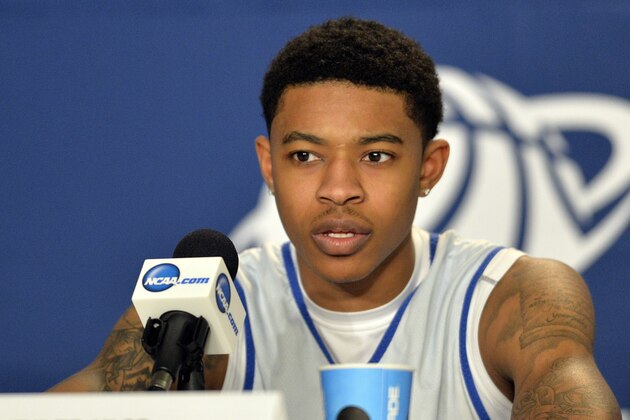 Kentucky's Tyler Ulis answers a reporter's questions at a news conference before practice for an NCAA college basketball second-round game in Louisville, Ky., Wednesday, March 18, 2015. Kentucky is to play Hampton on Thursday. (AP Photo/Timothy D. Easley)