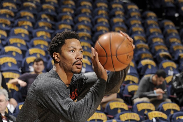 CLEVELAND, OH - APRIL 5:  Derrick Rose #1 of the Chicago Bulls warms up before the game against the Cleveland Cavaliers on April 5, 2015 at Quicken Loans Arena in Cleveland, Ohio. NOTE TO USER: User expressly acknowledges and agrees that, by downloading and/or using this Photograph, user is consenting to the terms and conditions of the Getty Images License Agreement. Mandatory Copyright Notice: Copyright 2015 NBAE (Photo by David Liam Kyle/NBAE via Getty Images)