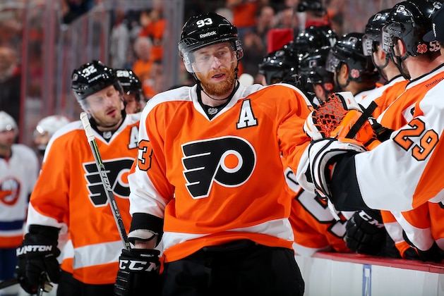 PHILADELPHIA, PA - APRIL 07:  Jakub Voracek #93 of the Philadelphia Flyers celebrates his assist with teammates on the bench after Claude Giroux scored in the first period against the New York Islanders on April 7, 2015 at the Wells Fargo Center in Philadelphia, Pennsylvania.  (Photo by Elsa/Getty Images)