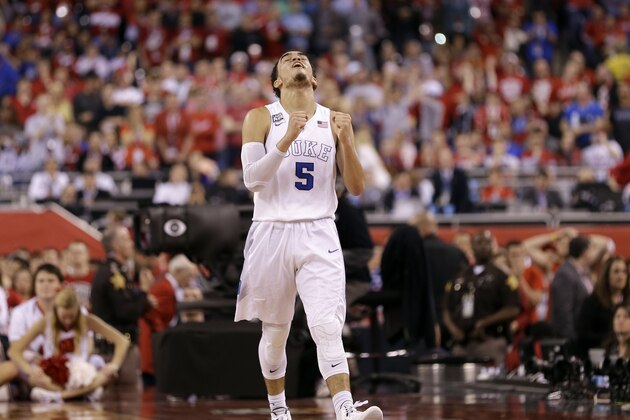 Duke's Tyus Jones reacts during the second half of the NCAA Final Four college basketball tournament championship game against Wisconsin Monday, April 6, 2015, in Indianapolis. Duke won 68-63. (AP Photo/David J. Phillip)