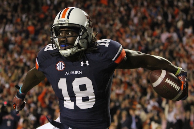 Auburn wide receiver Sammie Coates (18) celebrates after a touchdown during the first half of an NCAA college football game against Florida Atlantic on Saturday, Oct. 26, 2013, in Auburn, Ala. (AP Photo/Butch Dill)