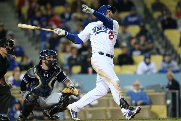 LOS ANGELES, CA - APRIL 07:  Adrian Gonzalez #23 of the Los Angeles Dodgers hits a solo home run in the eighth inning against the San Diego Padres at Dodger Stadium on April 7, 2015 in Los Angeles, California. The Padres won 7-3.  (Photo by Stephen Dunn/Getty Images)