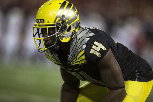 Oregon cornerback Ifo Ekpre-Olomu (14) waits for the start of the play against Washington State during the first quarter of an NCAA college football game Saturday, Sept. 20, 2014, at Martin Stadium in Pullman, Wash. Oregon won 38-31. (AP Photo/Dean Hare)
