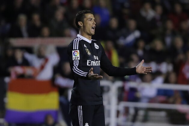 Real's Cristiano Ronaldo gestures during a Spanish La Liga soccer match between Rayo Vallecano and Real Madrid at the Vallecas stadium in Madrid, Spain, Wednesday, April 8, 2015. (AP Photo/Andres Kudacki)
