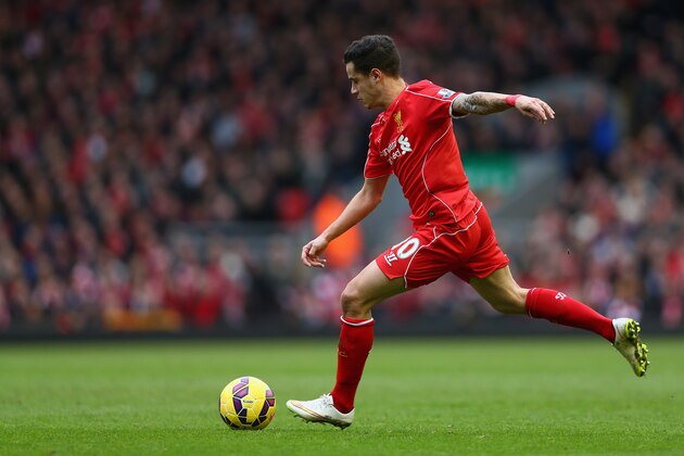 LIVERPOOL, ENGLAND - MARCH 01:  Philippe Coutinho of Liverpool takes a shot at goal during the Barclays Premier League match between Liverpool and Manchester City at Anfield on March 1, 2015 in Liverpool, England.  (Photo by Clive Brunskill/Getty Images)