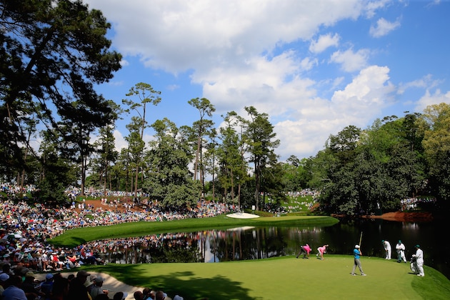 AUGUSTA, GA - APRIL 08:  Patrons watch the play during the Par 3 Contest prior to the start of the 2015 Masters Tournament at Augusta National Golf Club on April 8, 2015 in Augusta, Georgia.  (Photo by Jamie Squire/Getty Images)