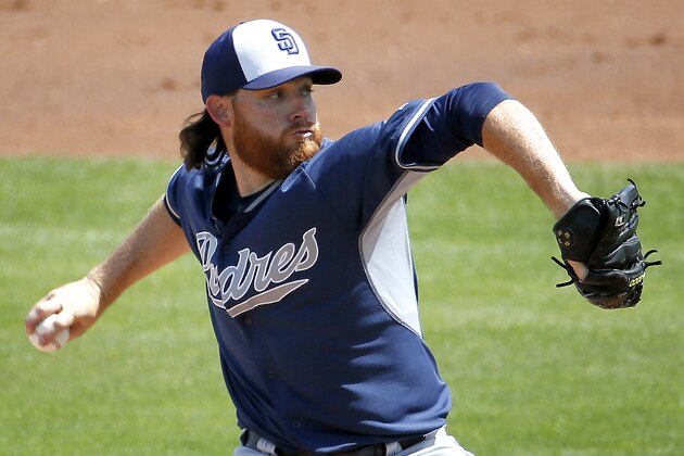 San Diego Padres pitcher Ian Kennedy throws against the Cincinnati Reds during the first inning of a spring training exhibition baseball game Monday, March 30, 2015, in Goodyear, Ariz. (AP Photo/Matt York)