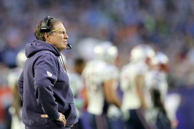 New England Patriots head coach Bill Belichick walks the sidelines against the Seattle Seahawks during the Super Bowl on Sunday, February 1, 2015 in Glendale, AZ.  (AP Photo/Gregory Payan)