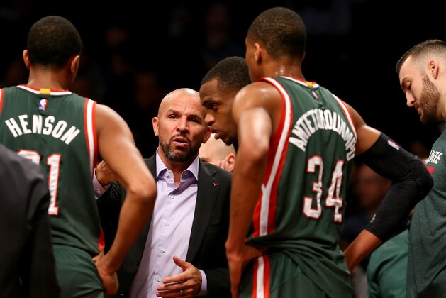 NEW YORK, NY - MARCH 20:  Head coach Jason Kidd of the Milwaukee Bucks talks to his players during a stop in play in the first quarter against the Brooklyn Nets at the Barclays Center on March 20, 2015 in the Brooklyn borough of New York City. NOTE TO USER: User expressly acknowledges and agrees that, by downloading and/or using this photograph, user is consenting to the terms and conditions of the Getty Images License Agreement.  (Photo by Elsa/Getty Images)