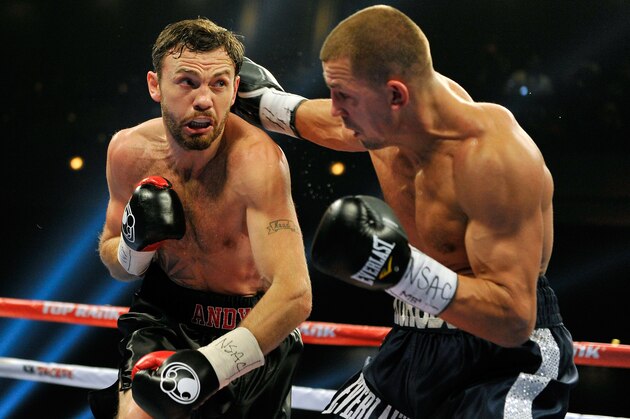LAS VEGAS, NV - DECEMBER 13:  Andy Lee (L) and Matt Korobov battle it out during their fight for a vacant WBO middleweight title at The Chelsea at The Cosmopolitan of Las Vegas on December 13, 2014 in Las Vegas, Nevada. Lee won by a TKO in the sixth round. (Photo by David Becker/Getty Images)