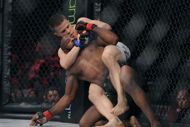 May 17, 2014; Southaven, MS, USA; Nate Jolly (red gloves) fights against Marcin Held during BFC 120 at Landers Center. Mandatory Credit: Justin Ford-USA TODAY Sports