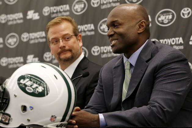 New York Jets new head coach Todd Bowles, right, speaks during an NFL football press conference introducing the team's new management, Wednesday, Jan. 21, 2015, in Florham Park, N.J. The team's new general manager Mike Maccagnan, left, looks on. (AP Photo/Julio Cortez)