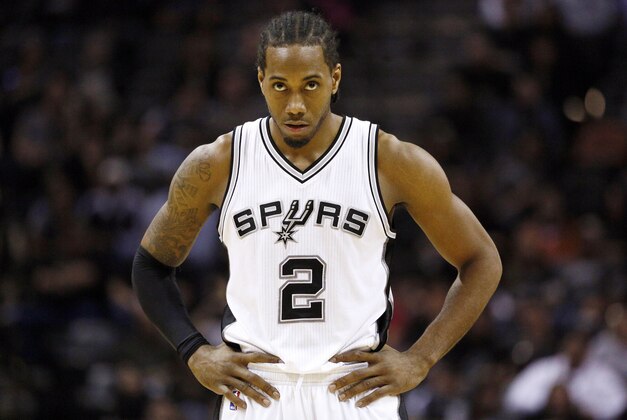 Jan 25, 2015; San Antonio, TX, USA; San Antonio Spurs small forward Kawhi Leonard (2) watches a free throw during the first half against the Milwaukee Bucks at AT&T Center. Mandatory Credit: Soobum Im-USA TODAY Sports