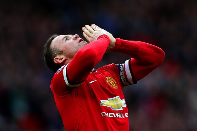 MANCHESTER, ENGLAND - APRIL 04:  Wayne Rooney of Manchester United celebrates after scoring his team's second goal during the Barclays Premier League match between Manchester United and Aston Villa at Old Trafford on April 4, 2015 in Manchester, England.  (Photo by Alex Livesey/Getty Images)