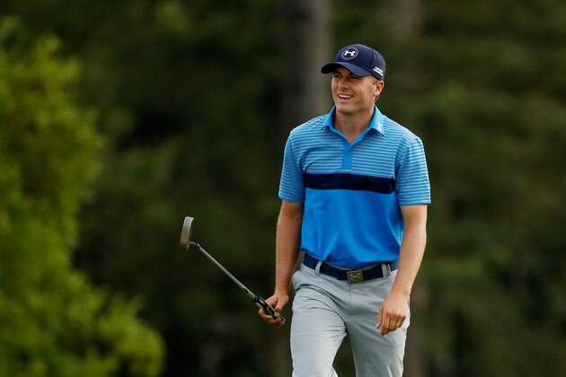 AUGUSTA, GA - APRIL 09:  Jordan Spieth of the United States smiles as he walks to the 18th green during the first round of the 2015 Masters Tournament at Augusta National Golf Club on April 9, 2015 in Augusta, Georgia.  (Photo by Ezra Shaw/Getty Images)