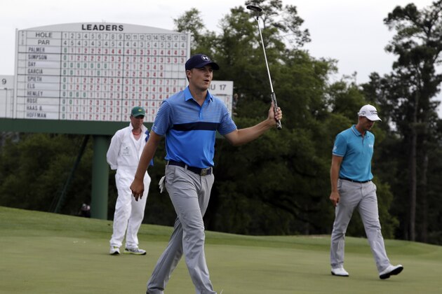 Jordan Spieth reacts after his birdie on the 18th hole during the first round of the Masters golf tournament Thursday, April 9, 2015, in Augusta, Ga. (AP Photo/Chris Carlson)