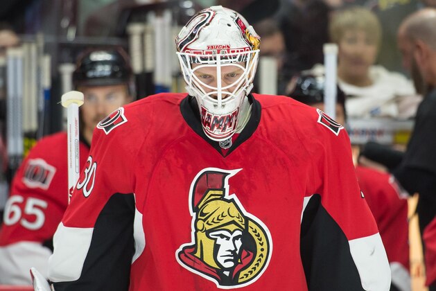 Mar 21, 2015; Ottawa, Ontario, CAN; Ottawa Senators goalie Andrew Hammond (30) skates during a break in action in the third period agianst the Toronto Maple Leafs at the Canadian Tire Centre. The Senators defeated the Maple Leafs 5-3. Mandatory Credit: Marc DesRosiers-USA TODAY Sports